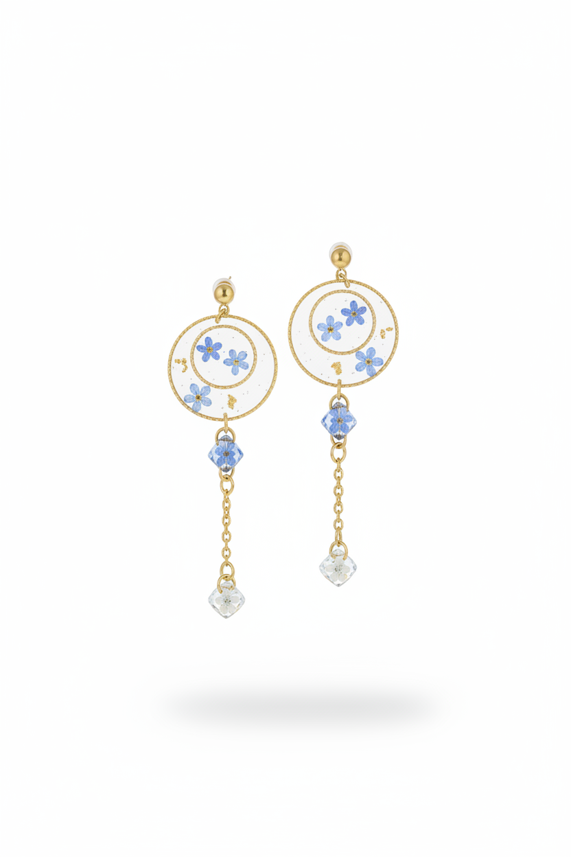 Boucle d'oreille myosotis en lévitation