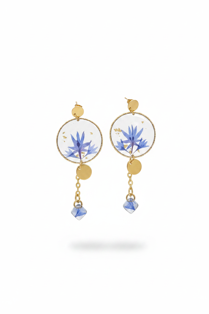 Boucles d'oreilles bleues avec feuilles d'or en lévitation
